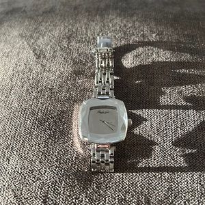 Kenneth Cole silver watch.